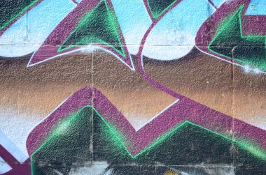 Grafiti çizimler parçası. Eski duvar boya lekeleri sokak sanatı kültür tarzı ile dekore edilmiştir. Renkli arka plan doku soğuk tonlarda.