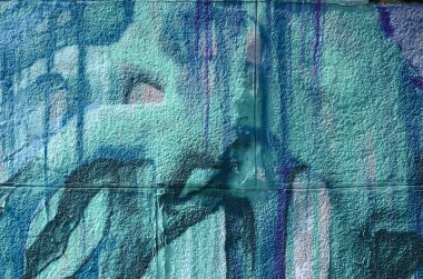 Grafiti çizimler parçası. Eski duvar boya lekeleri sokak sanatı kültür tarzı ile dekore edilmiştir. Çok renkli arka plan dokusu.