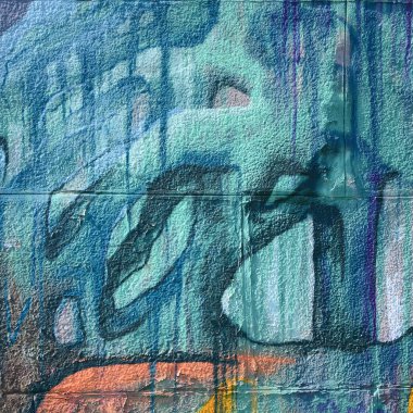 Grafiti çizimler parçası. Eski duvar boya lekeleri sokak sanatı kültür tarzı ile dekore edilmiştir. Çok renkli arka plan dokusu.