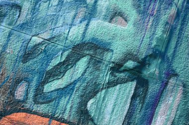 Grafiti çizimler parçası. Eski duvar boya lekeleri sokak sanatı kültür tarzı ile dekore edilmiştir. Çok renkli arka plan dokusu.