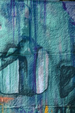 Grafiti çizimler parçası. Eski duvar boya lekeleri sokak sanatı kültür tarzı ile dekore edilmiştir. Çok renkli arka plan dokusu.