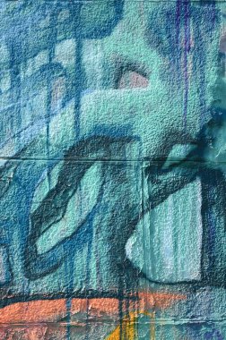 Grafiti çizimler parçası. Eski duvar boya lekeleri sokak sanatı kültür tarzı ile dekore edilmiştir. Çok renkli arka plan dokusu.