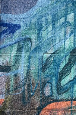 Grafiti çizimler parçası. Eski duvar boya lekeleri sokak sanatı kültür tarzı ile dekore edilmiştir. Çok renkli arka plan dokusu.