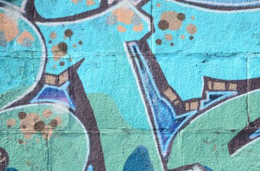 Grafiti çizimler parçası. Eski duvar boya lekeleri sokak sanatı kültür tarzı ile dekore edilmiştir. Renkli arka plan doku soğuk tonlarda.