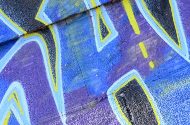 Grafiti çizimler parçası. Eski duvar boya lekeleri sokak sanatı kültür tarzı ile dekore edilmiştir. Renkli arka plan doku soğuk tonlarda.
