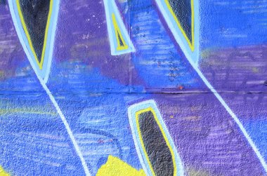 Grafiti çizimler parçası. Eski duvar boya lekeleri sokak sanatı kültür tarzı ile dekore edilmiştir. Renkli arka plan doku soğuk tonlarda.