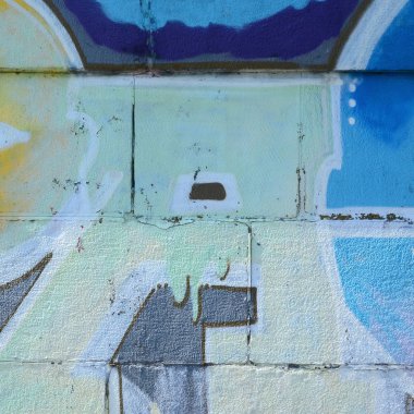 Grafiti çizimler parçası. Eski duvar boya lekeleri sokak sanatı kültür tarzı ile dekore edilmiştir. Çok renkli arka plan dokusu.