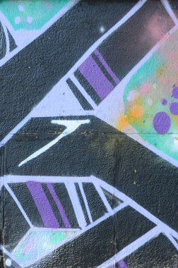 Grafiti çizimler parçası. Eski duvar boya lekeleri sokak sanatı kültür tarzı ile dekore edilmiştir. Renkli arka plan doku.