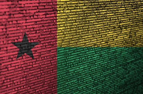 Guinea Bissau flag  is depicted on the screen with the program code. The concept of modern technology and site development.