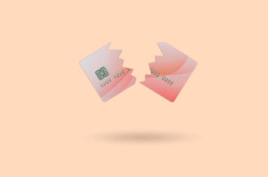 Kes ve kırık kırmızı kredi kartı pastel turuncu uzayda. Bankacılık servisleri kullanmak için yasak kavramı. Kredi kartı yakında son tarihi: