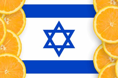 İsrail bayrağı portakal Narenciye meyve dilimleri dikey çerçeve içinde. İthalat ve ihracat narenciye yanı sıra büyüyen kavramı