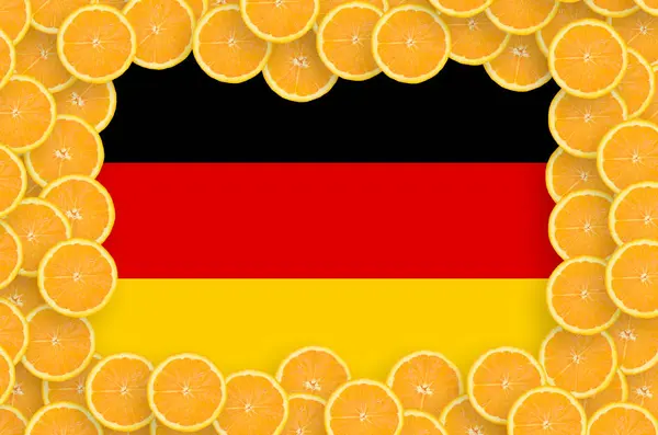 Σημαία Γερμανίας Στο Πλαίσιο Της Φέτες Πορτοκαλιού Εσπεριδοειδών Έννοια Της — Φωτογραφία Αρχείου