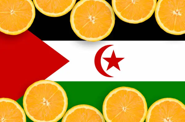 Western Sahara Flag Horizontal Frame Orange Citrus Fruit Slices Concept — Stock Photo, Image
