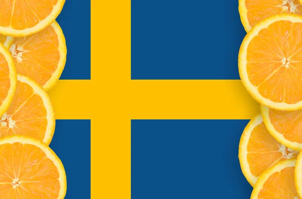 Sweden flag  in vertical frame of orange citrus fruit slices. Concept of growing as well as import and export of citrus fruits