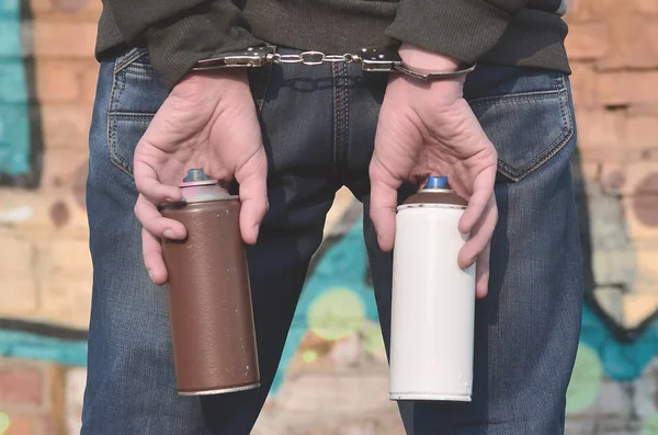 Rear View Arrested Street Artist Handcuffs Which Holds Aerosol Spray — Stock Photo, Image