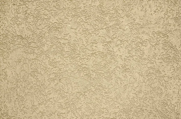 The texture of the beige decorative plaster in bark beetle style. Russian variation of decorating facade walls — Stock Image Texture Beige Decorative Plaster Bark Beetle Style Russian Variation Decorating Stock Photo