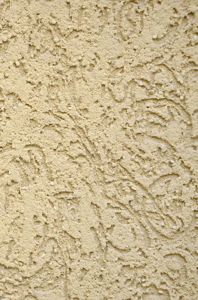 The texture of the beige decorative plaster in bark beetle style. Russian variation of decorating facade walls — Stock Image Texture Beige Decorative Plaster Bark Beetle Style Russian Variation Decorating Stock Picture