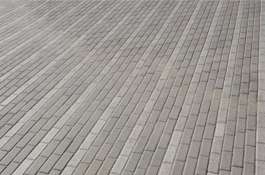 Kasaba meydanında cobblestones yoldan. Arka plan doku perspektif içinde