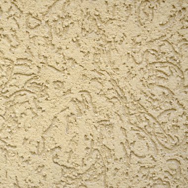 Dekoratif bej doku alçı kabukları böcek tarzında. Cephe dekorasyon Rus varyasyon