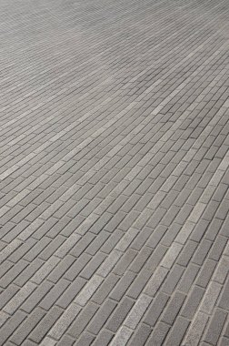 Kasaba meydanında cobblestones yoldan. Arka plan doku perspektif içinde