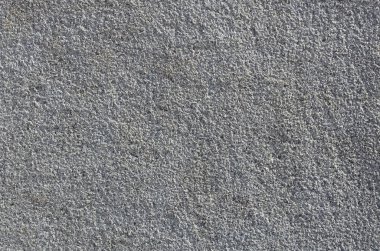 Kaba beton duvar doku kabartma doku ile. Düz gri yüzeyi