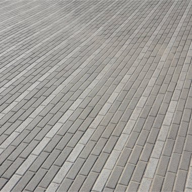 Kasaba meydanında cobblestones yoldan. Arka plan doku perspektif içinde