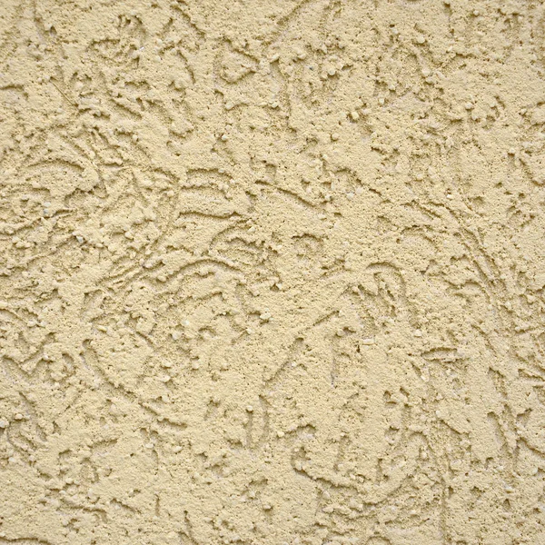 The texture of the beige decorative plaster in bark beetle style. Russian variation of decorating facade walls — Stock Image Texture Beige Decorative Plaster Bark Beetle Style Russian Variation Decorating Royalty Free Stock Images