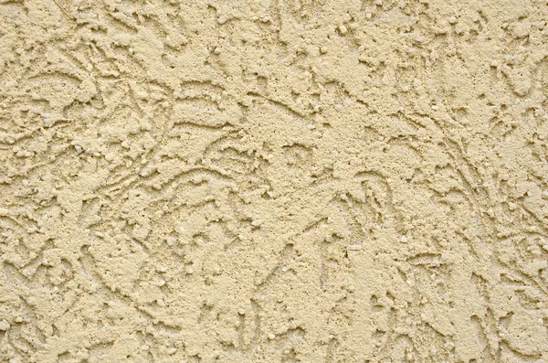 The texture of the beige decorative plaster in bark beetle style. Russian variation of decorating facade walls — Stock Image Texture Beige Decorative Plaster Bark Beetle Style Russian Variation Decorating Stock Image