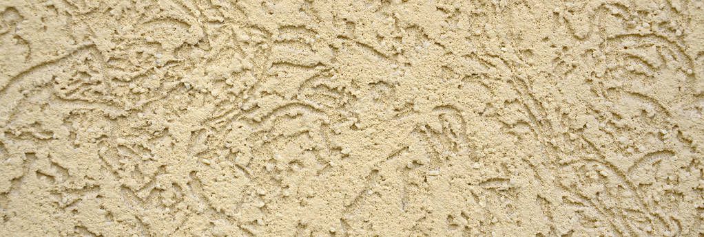 The texture of the beige decorative plaster in bark beetle style. Russian variation of decorating facade walls — Stock Image Texture Beige Decorative Plaster Bark Beetle Style Russian Variation Decorating Stock Photo