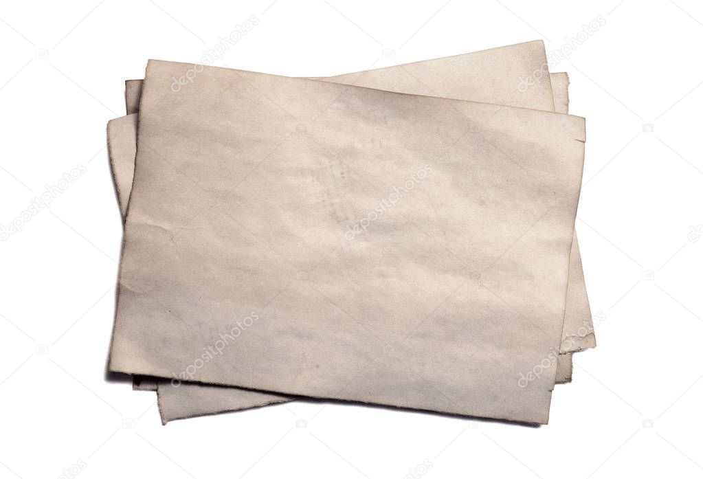 Few old blank pieces of antique vintage crumbling paper manuscript or parchment horizontally oriented isolated on white