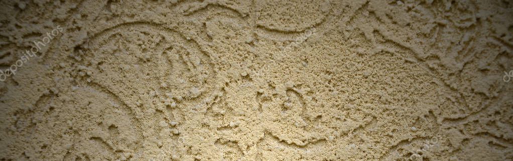 The texture of the beige decorative plaster in bark beetle style. Russian variation of decorating facade walls — Stock Image Texture Beige Decorative Plaster Bark Beetle Style Russian Variation Decorating Stock Image