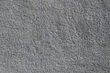 Kaba beton duvar doku kabartma doku ile. Düz gri yüzeyi
