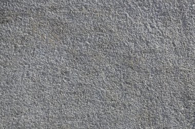 Kaba beton duvar doku kabartma doku ile. Düz gri yüzeyi