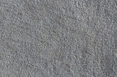 Kaba beton duvar doku kabartma doku ile. Düz gri yüzeyi