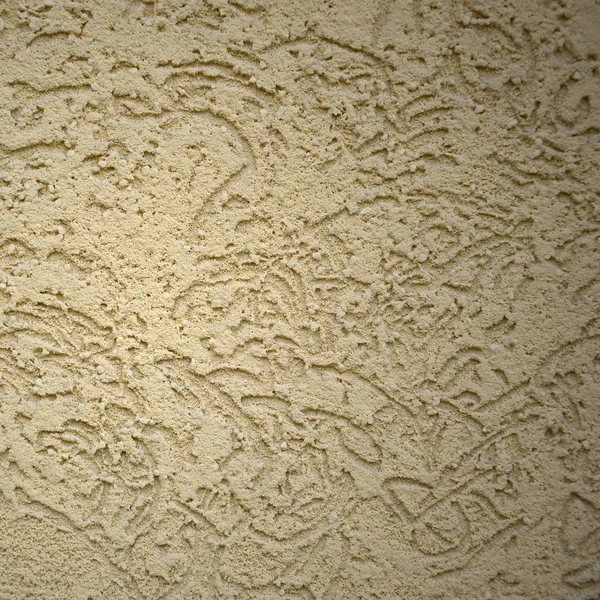 The texture of the beige decorative plaster in bark beetle style. Russian variation of decorating facade walls — Stock Image Texture Beige Decorative Plaster Bark Beetle Style Russian Variation Decorating Royalty Free Stock Images