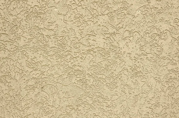 The texture of the beige decorative plaster in bark beetle style. Russian variation of decorating facade walls — Stock Image Texture Beige Decorative Plaster Bark Beetle Style Russian Variation Decorating Stock Image