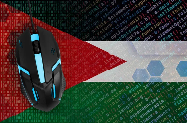 Jordan flag  and modern backlit computer mouse. The concept of digital threat, illegal actions on the Internet