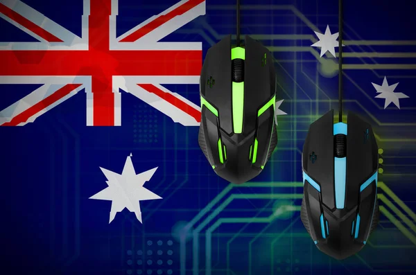 Australia flag  and two modern computer mice with backlight. The concept of online cooperative games. Cyber sport team