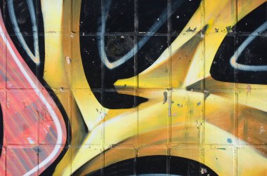 Konturlar ve gölgeleme yakın ile renkli sokak sanatı grafiti resimlerinin parçası. Gençlik çağdaş sanat kültürünün arka plan dokusu. Sarı turuncu ve kahverengi renkler