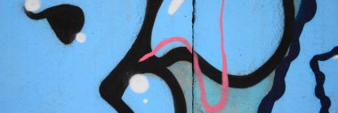 Fragment of colored street art graffiti paintings with contours and shading close up. Background texture of youth contemporary art culture. Blue and black colors clipart
