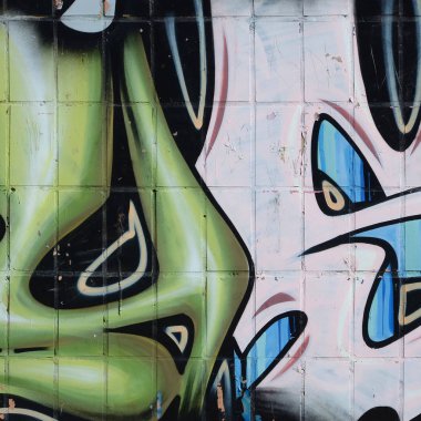 Konturlar ve gölgeleme yakın ile renkli sokak sanatı grafiti resimlerinin parçası. Gençlik çağdaş sanat kültürünün arka plan dokusu. Yeşil sarı renkler