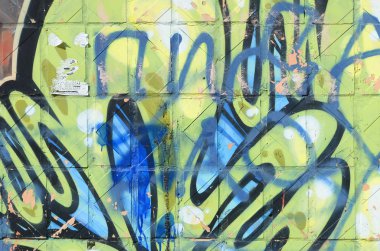 Konturlar ve gölgeleme yakın ile renkli sokak sanatı grafiti resimlerinin parçası. Gençlik çağdaş sanat kültürünün arka plan dokusu. Yeşil sarı renkler