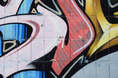 Konturlar ve gölgeleme yakın ile renkli sokak sanatı grafiti resimlerinin parçası. Gençlik çağdaş sanat kültürünün arka plan dokusu. Sarı turuncu ve kahverengi renkler