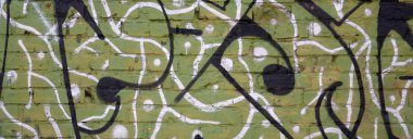 Konturlar ve gölgeleme yakın ile renkli sokak sanatı grafiti resimlerinin parçası. Gençlik çağdaş sanat kültürünün arka plan dokusu. Yeşil sarı renkler