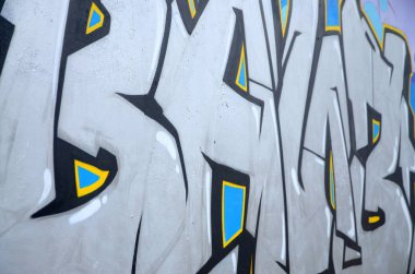 Konturlar ve gölgeleme yakın ile renkli sokak sanatı grafiti resimlerinin parçası. Gençlik çağdaş sanat kültürünün arka plan dokusu. Mavi ve krom renkler
