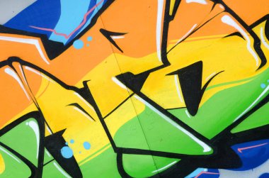 Konturlar ve gölgeleme yakın ile renkli sokak sanatı grafiti resimlerinin parçası. Gençlik çağdaş sanat kültürünün arka plan dokusu. Turuncu sarı ve yeşil renkler