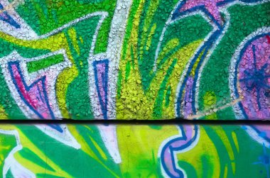 Konturlar ve gölgeleme yakın ile renkli sokak sanatı grafiti resimlerinin parçası. Gençlik çağdaş sanat kültürünün arka plan dokusu. Yeşil ve sarı renkler