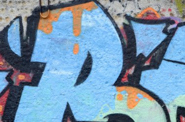 Konturlar ve gölgeleme yakın ile renkli sokak sanatı grafiti resimlerinin parçası. Gençlik çağdaş sanat kültürünün arka plan dokusu. Mavi turuncu ve siyah renkler