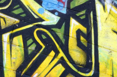 Konturlar ve gölgeleme yakın ile renkli sokak sanatı grafiti resimlerinin parçası. Gençlik çağdaş sanat kültürünün arka plan dokusu. Sarı turuncu ve kahverengi renkler