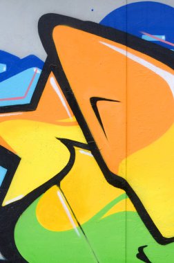 Konturlar ve gölgeleme yakın ile renkli sokak sanatı grafiti resimlerinin parçası. Gençlik çağdaş sanat kültürünün arka plan dokusu. Turuncu sarı ve yeşil renkler